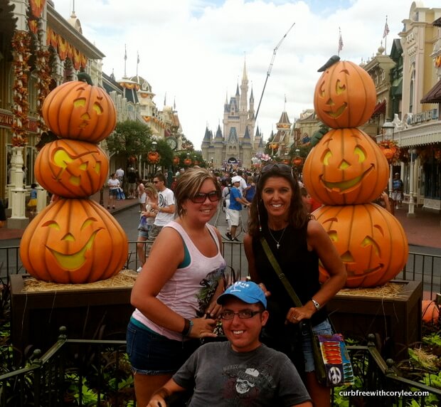 My best friend Kela, my mom, and I visited Magic Kingdom for Halloween in 2012. Please pardon the huge crane that ruined all chances of a good picture that day. wheelchair access disney world