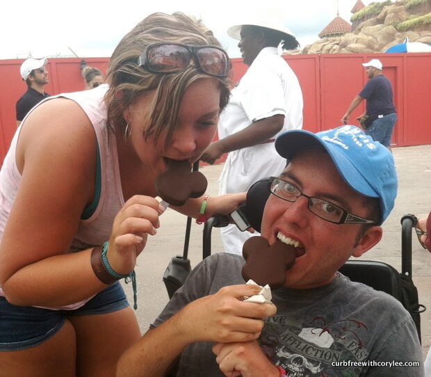 Kela and I chowing down on some Mickey Bars! wheelchair access disney world