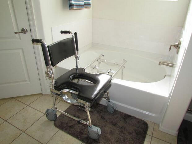 The chair can even slide over into the tub! go anywhere chair