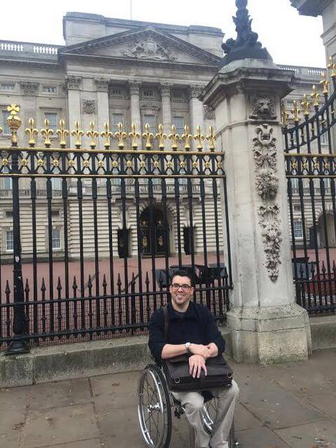 Brett in front of Buckingham Palace in London, England.