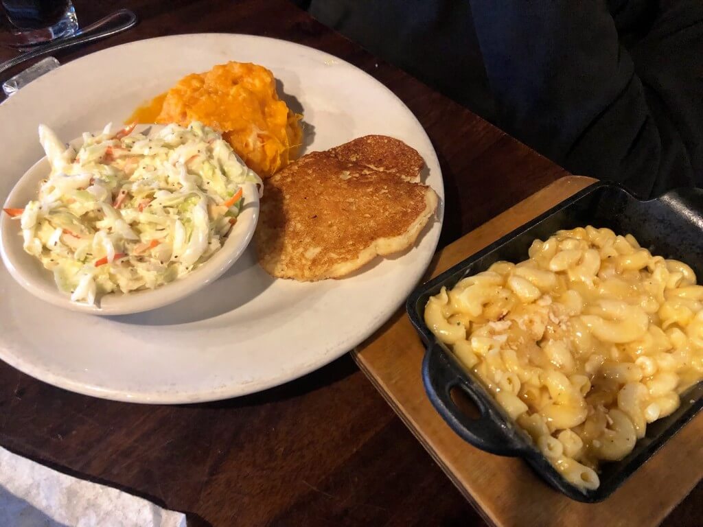 Veggie plate with macaroni and cheese, smashed sweet potatoes, and coleslaw